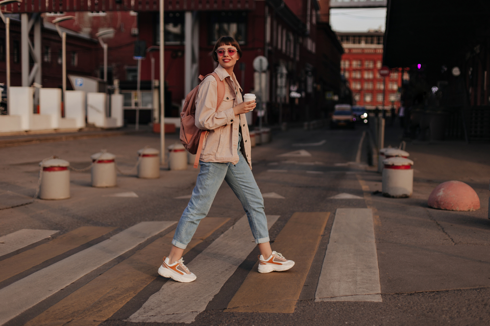 Optimistic,Lady,In,Light,Outfit,Walks,Outside.,Modern,Girl,In
